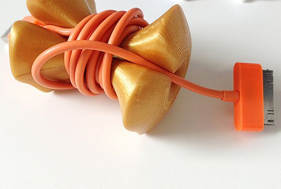 картинка Катушка для кабеля в форме огрызка яблока